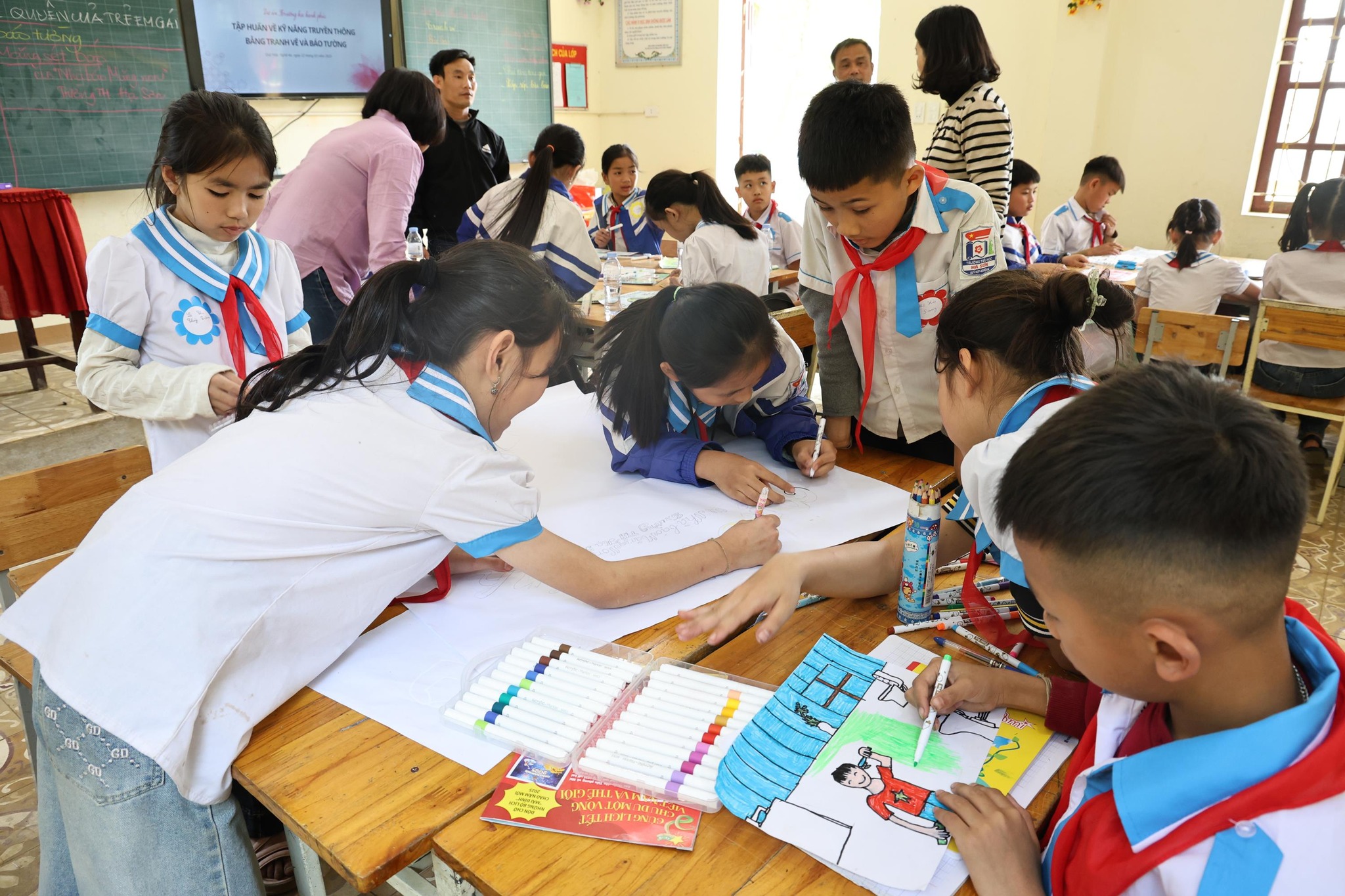 Training workshop on visual communication skills through illustrated posters and wall newspapers